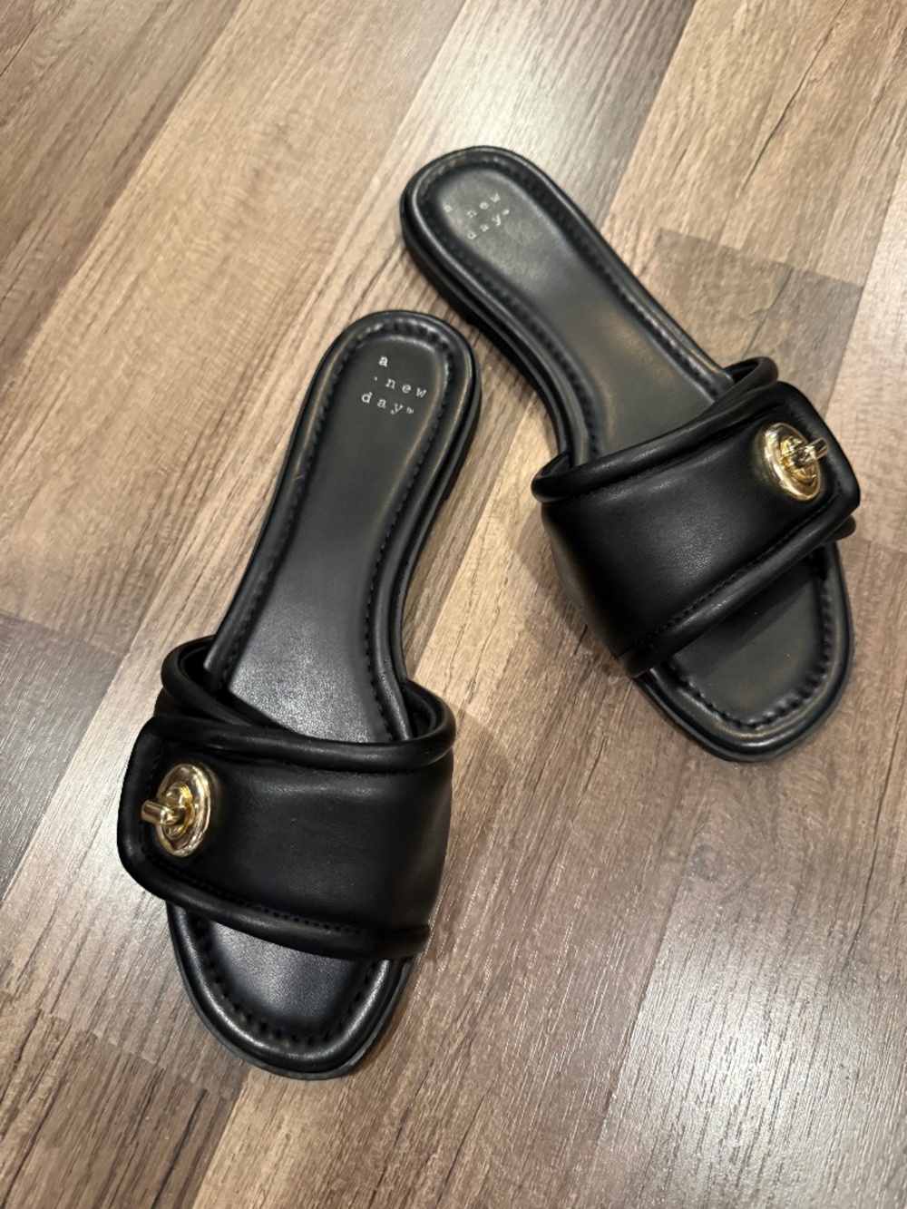 A New Day slide sandals in black with gold accent - size 7